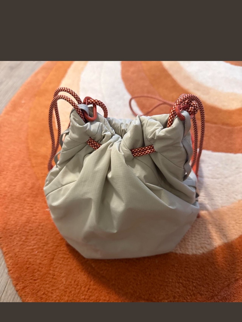 Off-White Beige Mini Drawstring Bag with Orange Rope Detail